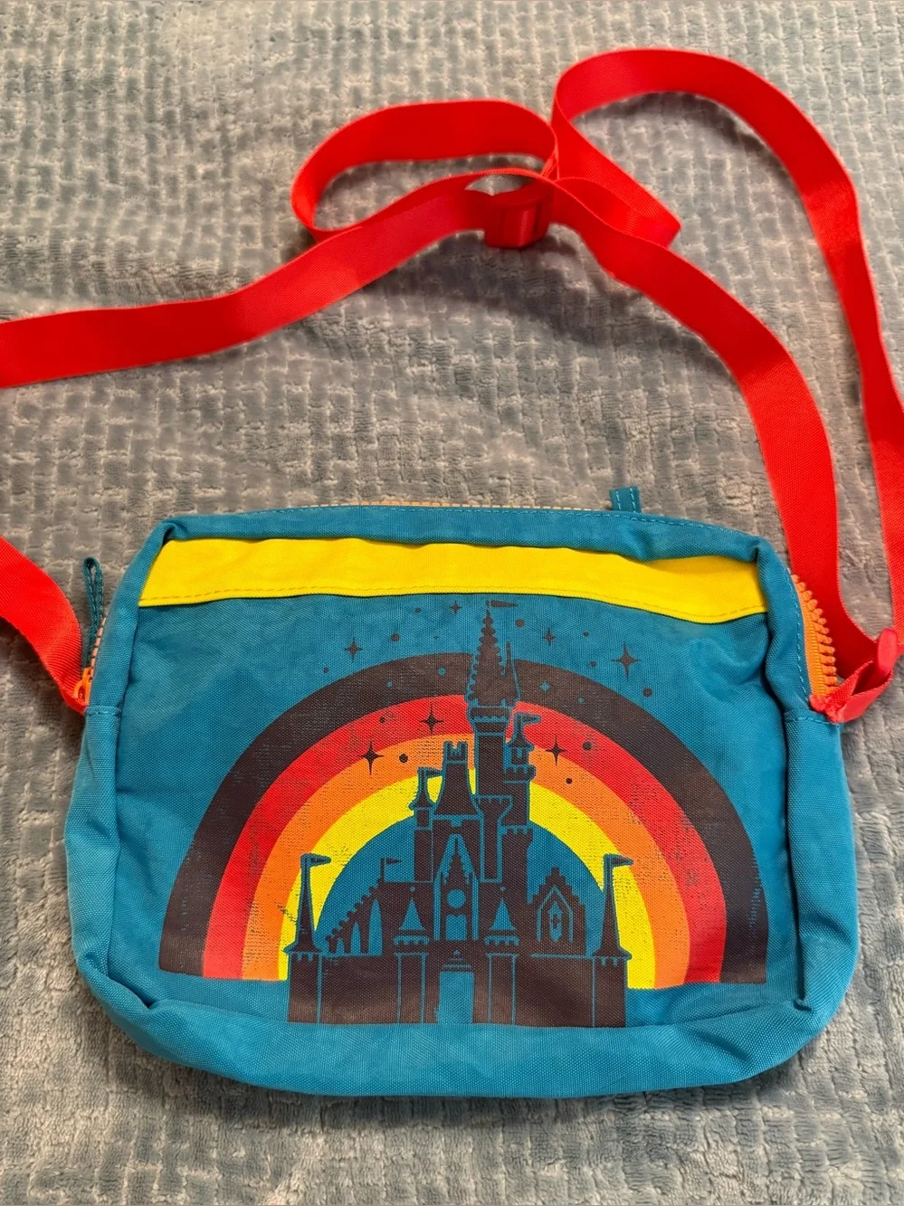 Walt Disney World Kids Teal Crossbody Bag with Yellow Panels and Red Strap